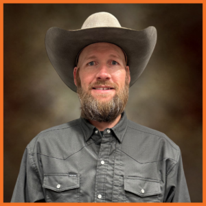 A man with a beard and cowboy hat.